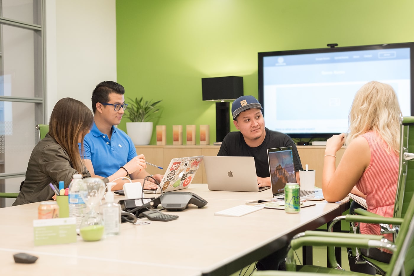 interns discussing project in meeting